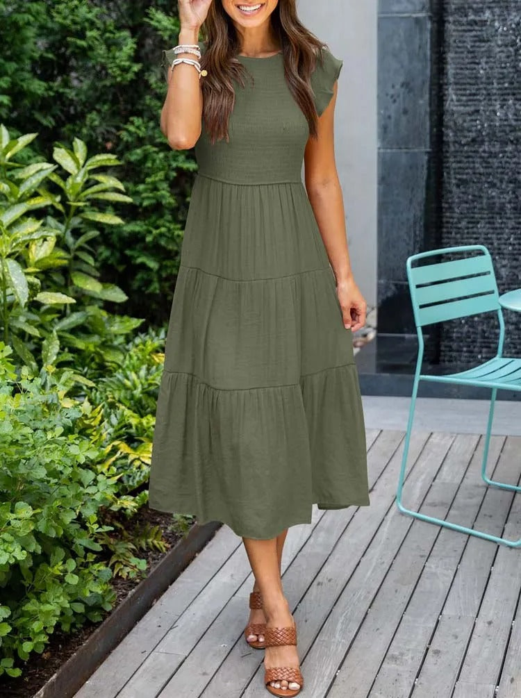 Luchtig ontwerp met ruches en praktische zakken Elegante zomerjurk - Seaton