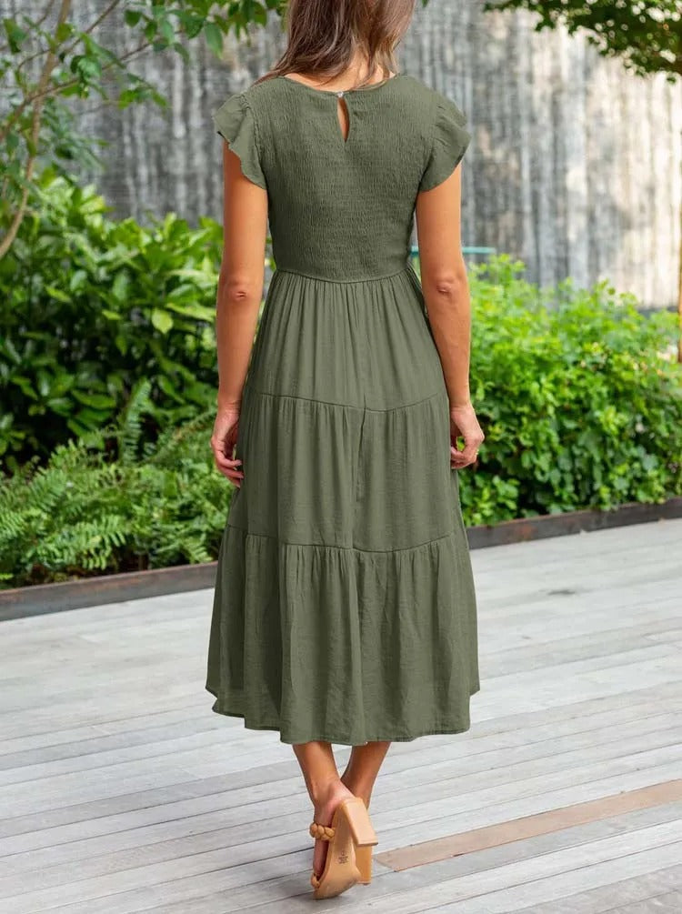 Luchtig ontwerp met ruches en praktische zakken Elegante zomerjurk - Seaton