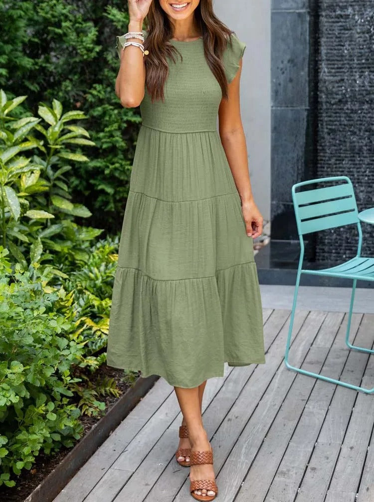 Luchtig ontwerp met ruches en praktische zakken Elegante zomerjurk - Seaton