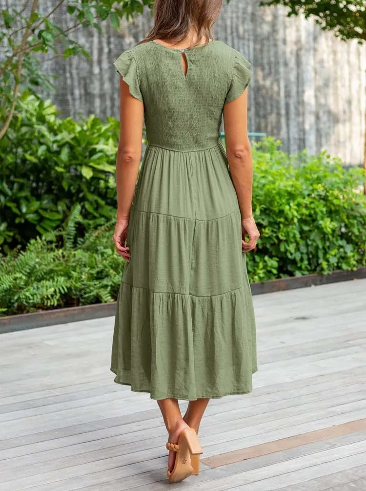 Luchtig ontwerp met ruches en praktische zakken Elegante zomerjurk - Seaton