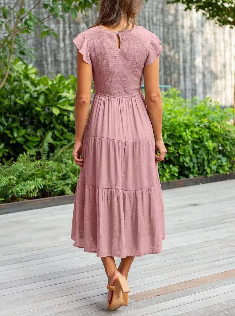 Luchtig ontwerp met ruches en praktische zakken Elegante zomerjurk - Seaton