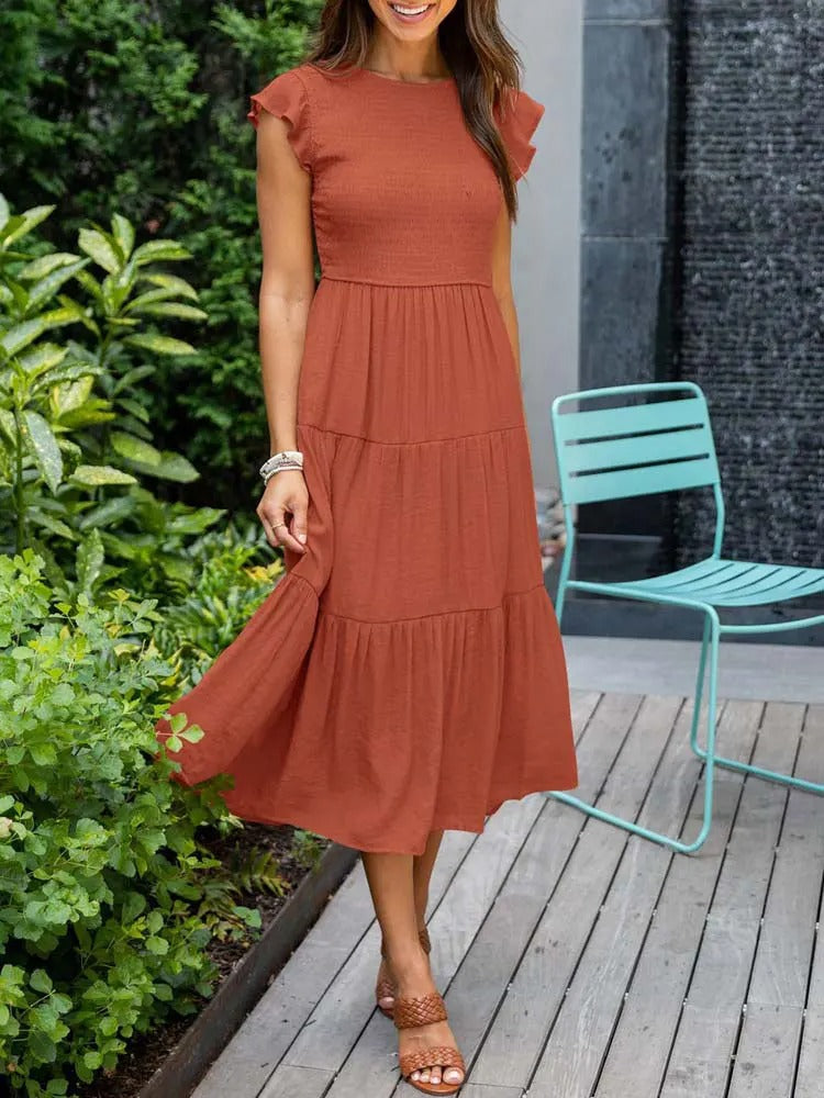Luchtig ontwerp met ruches en praktische zakken Elegante zomerjurk - Seaton